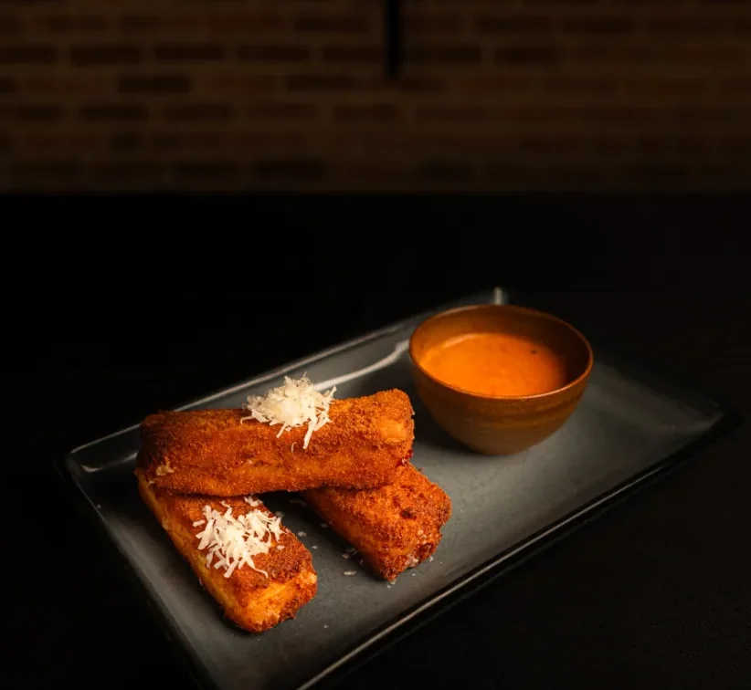 Fried mozzarella with pickled vegetables and marinara.