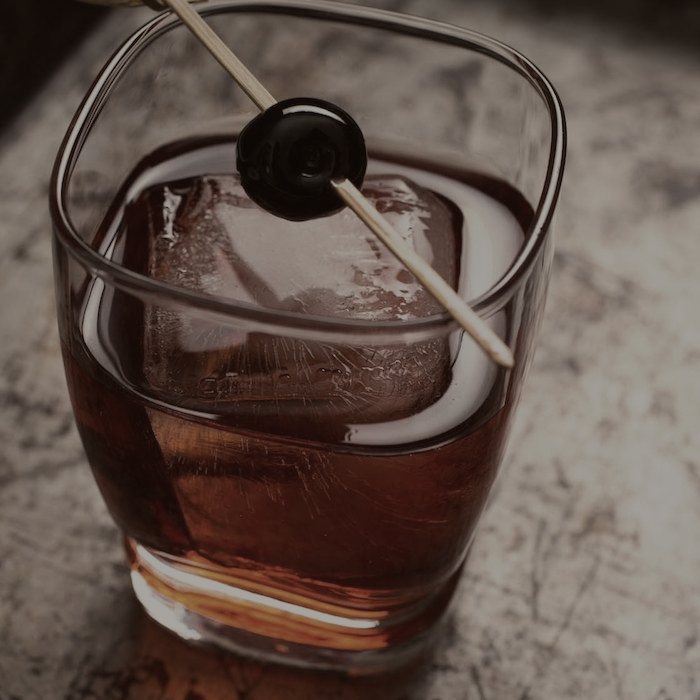 A boulevardier on the rocks with an orange twist.