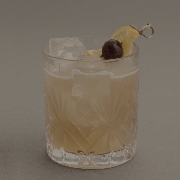 A whiskey sour with a red wine float.